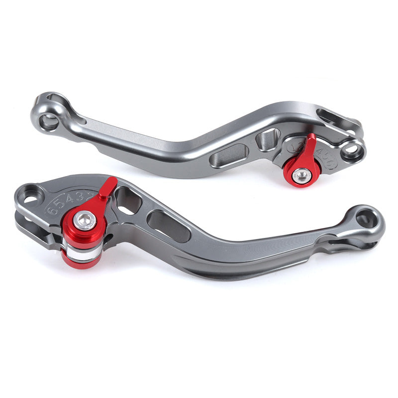 ENS. SHORT LEVERS TITANE/RED(PR)
